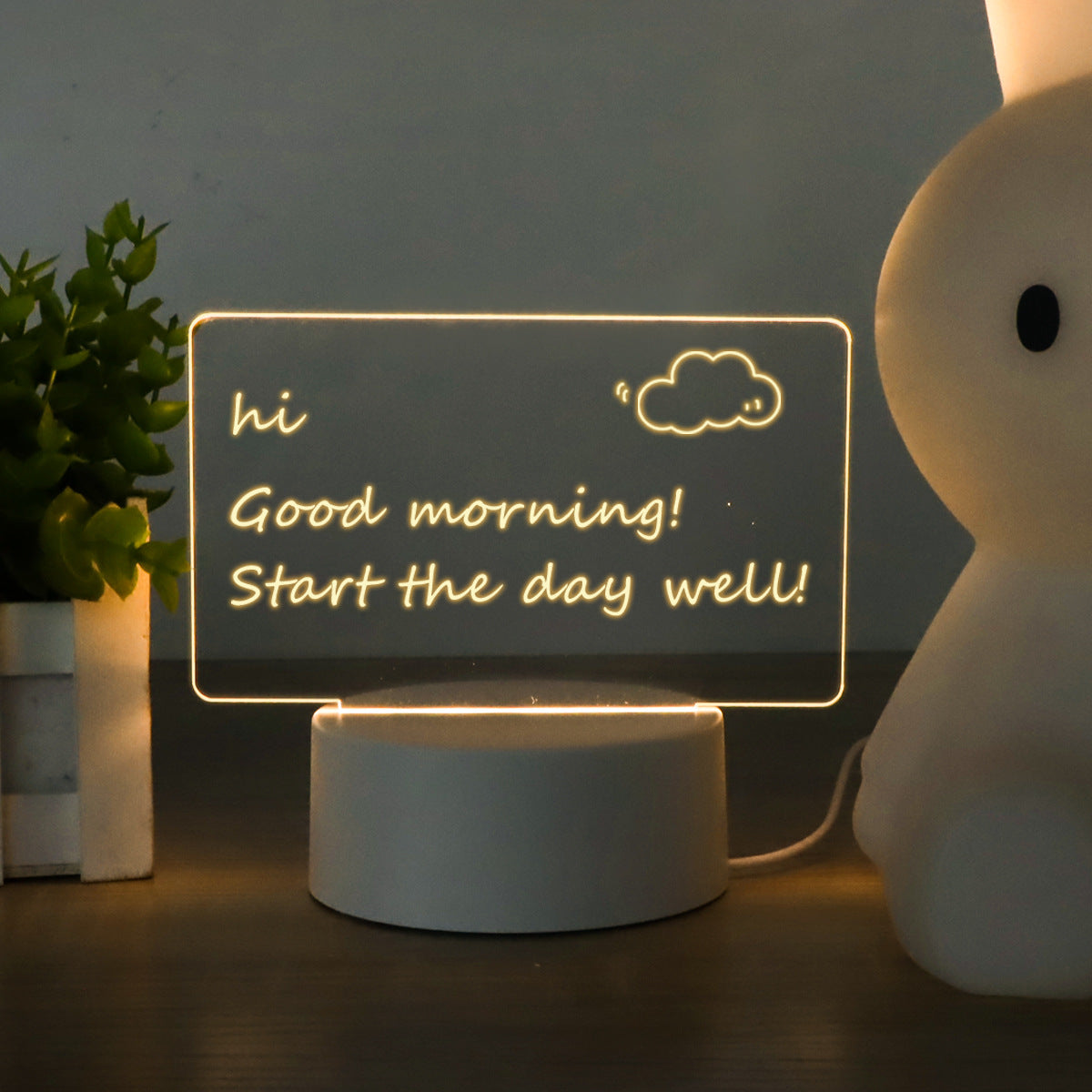 LED Acrylic Note Board with handwritten daily goals on a wooden desk