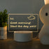 LED Acrylic Note Board with handwritten daily goals on a wooden desk