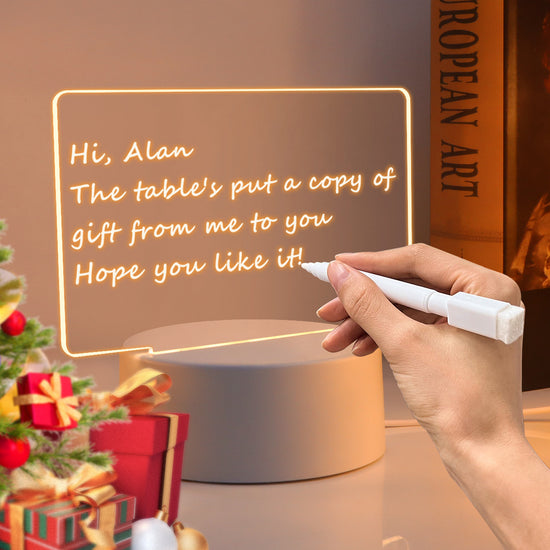 LED Acrylic Note Board with handwritten daily goals on a wooden desk
