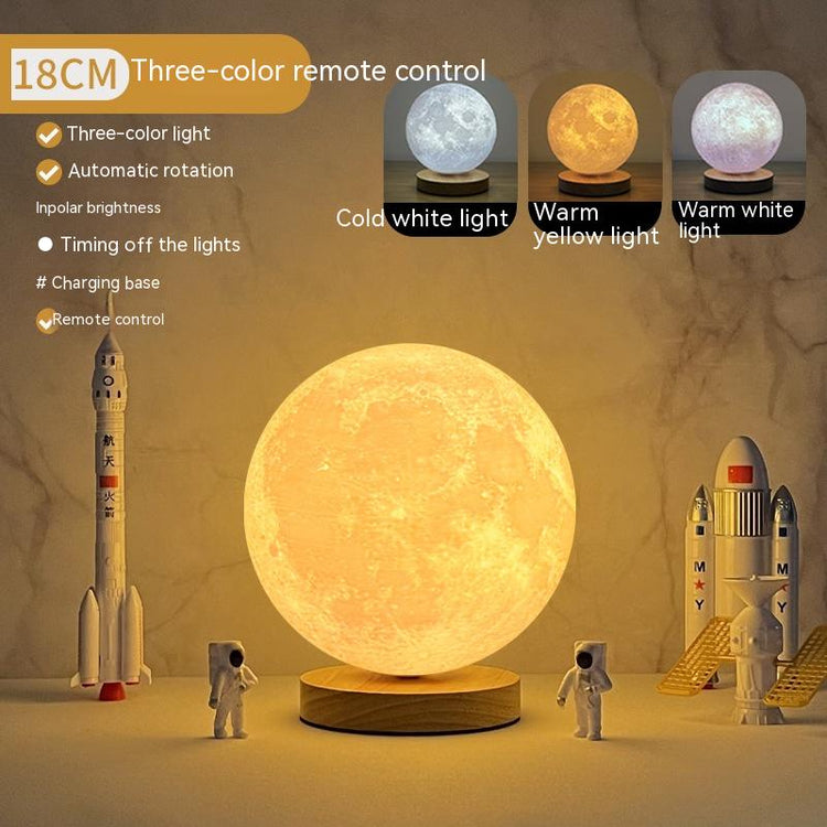 Rotating Moon Lamp on oak wood base glowing in a bedroom