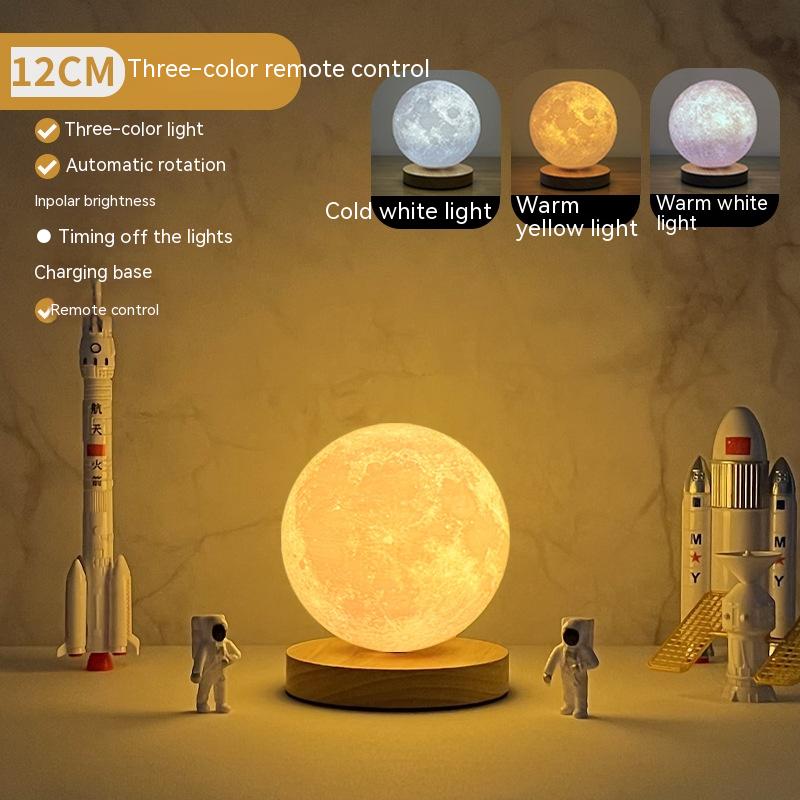 Rotating Moon Lamp on oak wood base glowing in a bedroom